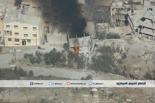 Les maisons incendiées à A?n al-Fijeh