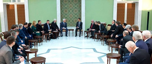Les députés russes et européens lors d'une rencontre avec le président syrien Bachar al-Assad
