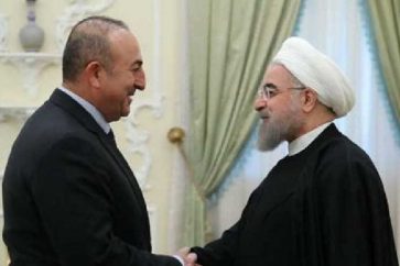 وزير الخارجية التركي مولود جاويش اوغلو يلتفي الرئيس روحاني