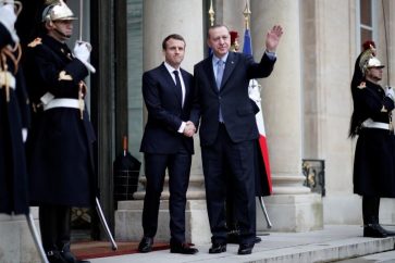 French President Emmanuel Macron welcomes Turkey's President Tayyip Erdogan at the Elysee Palace in Paris