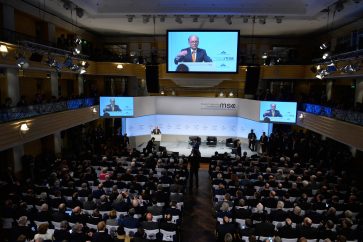 Wolfgang Ischinger, chairman of the Munich Security Conference (MSC), is displayed on giant screens as he gives a speech to open the 54th Munich Security Conference on February 16, 2018 in Munich, southern Germany. - Global security chiefs and top diplomats attend the annual Munich Security Conference running until February 18, 2018 to discuss Syria, Ukraine and other international conflicts and crises. (Photo by Thomas KIENZLE / AFP)