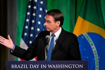Brazil's President Jair Bolsonaro speaks during a discussion on US-Brazil relations at the US Chamber of Commerce in Washington, DC on March 18, 2019. (Photo by MANDEL NGAN / AFP)        (Photo credit should read MANDEL NGAN/AFP/Getty Images)