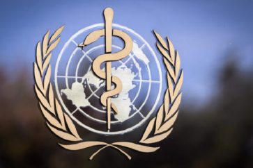 The logo of the World Health Organization (WHO) is pictured on the facade of the WHO headquarters on October 24, 2017 in Geneva. - The head of the World Health Organization on October 22, 2017 reversed his decision to name Zimbabwe's President Robert Mugabe a goodwill ambassador, saying it was in the "best interests" of the UN agency. (Photo by Fabrice COFFRINI / AFP)        (Photo credit should read FABRICE COFFRINI/AFP via Getty Images)