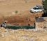 Des colons israéliens se baignent dans la source d'Ein Samiyah, près du village de Kafr Malik, en Cisjordanie occupée, le 15 juillet 2025.
